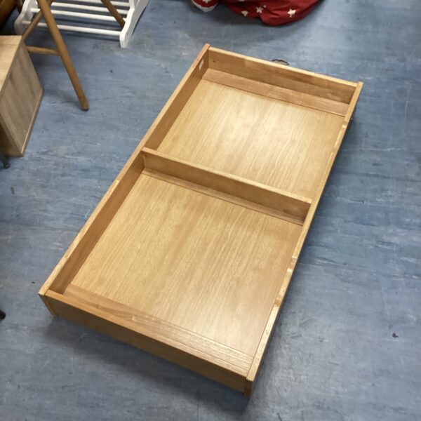 Wooden mama & papas under bed drawer for bedroom storage.