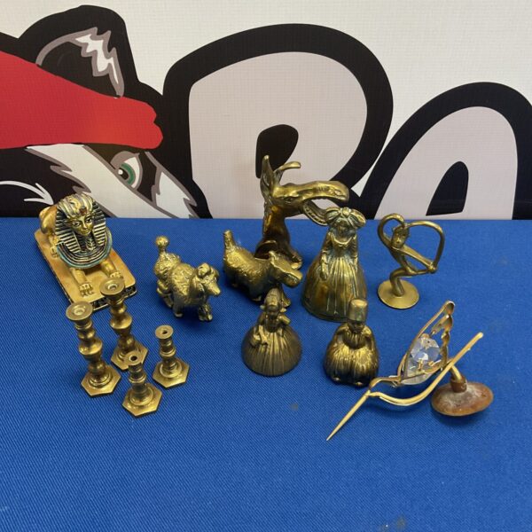 Vintage brass animal collection with bell and figurines.
