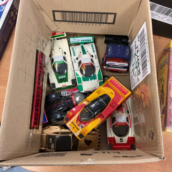 Vintage Scalextric cars and parts in a mixed lot.