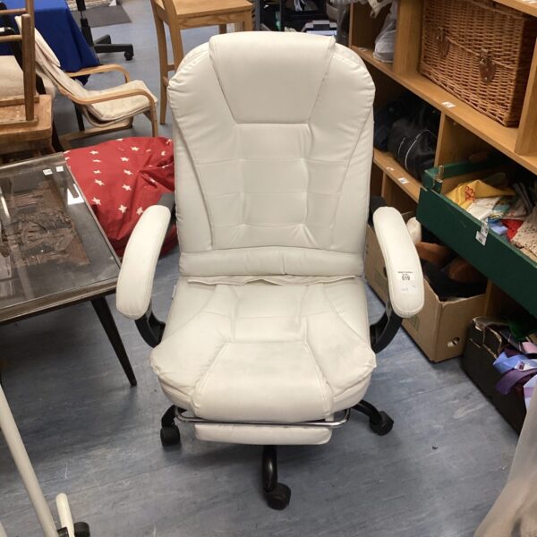 White massage swivel chair with high back and padded armrests.