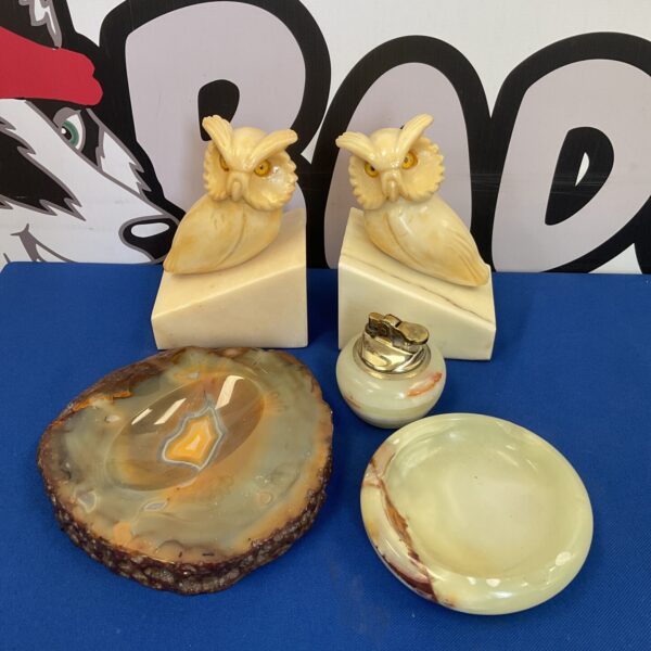 Vintage stone owl bookends and onyx dishes for home decor.