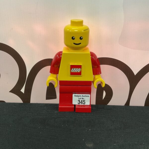 Yellow 2009 Lego flashlight, collectible Lego toy.