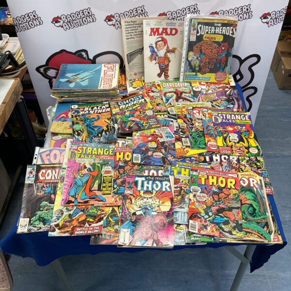 Large lot of vintage Marvel comics including Avengers and Spiderman.