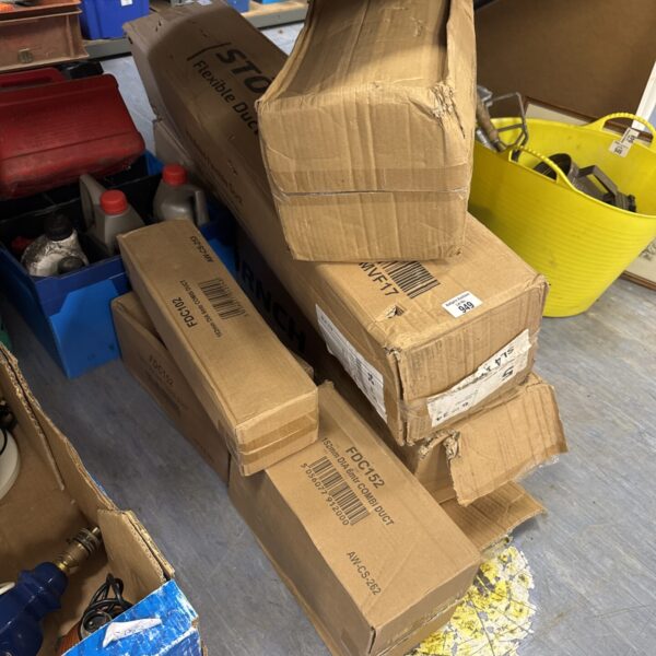 Stack of used combi duct components for ventilation systems.