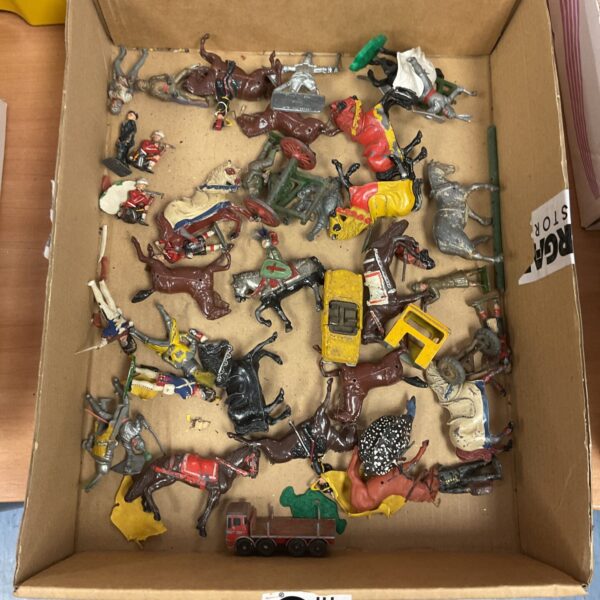 Vintage lead farm animals and figures in a lot.