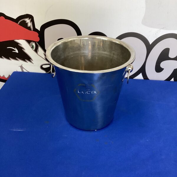 Polished stainless steel ice bucket with handles for serving drinks.