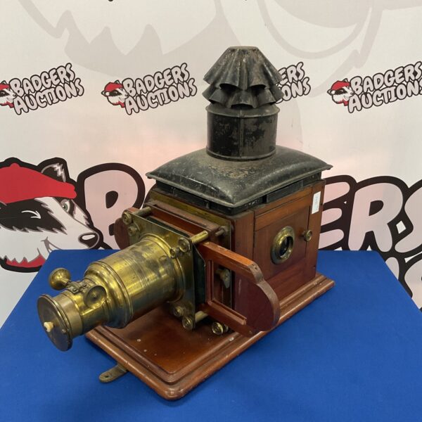 Brass Victorian magic lantern projector, antique optical device.