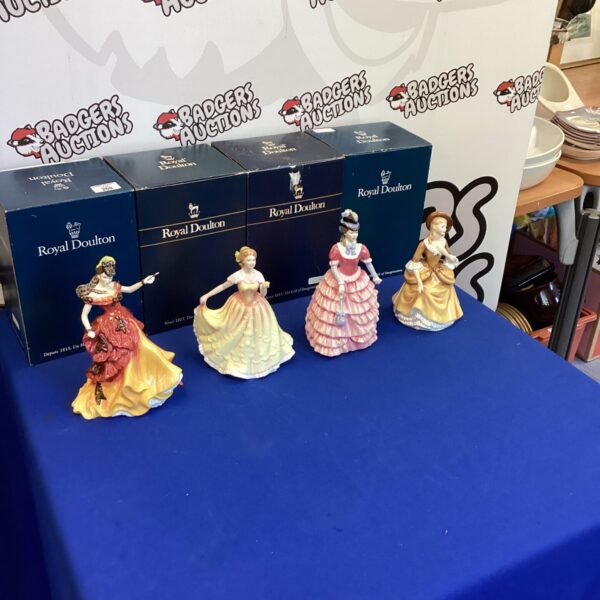 Royal Doulton figurines in original boxes, collectible porcelain figures.