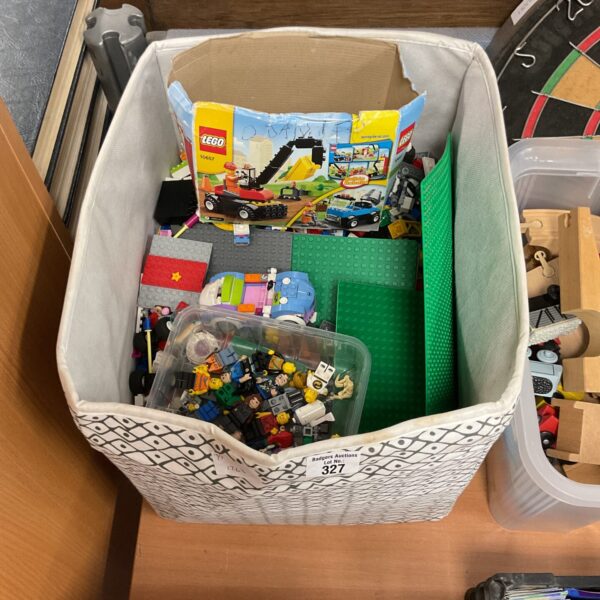 Mixed Lego lot with baseplates and minifigures for building.