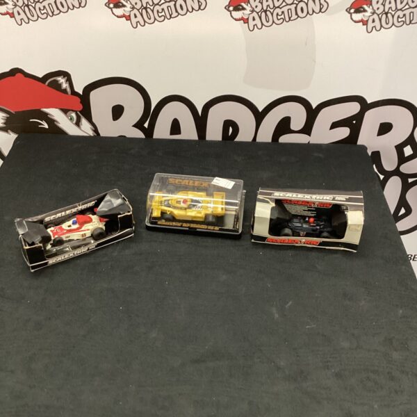 Vintage Scalextrix cars lot including a Renault model.