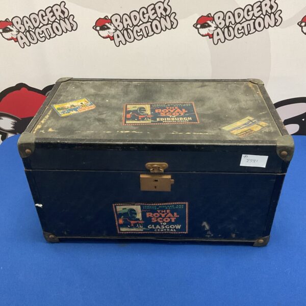 Vintage child's travel trunk with Royal Scot railway stickers.