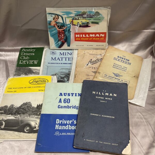 Lot of vintage classic car handbooks from Hillman, Morris, and Austin.