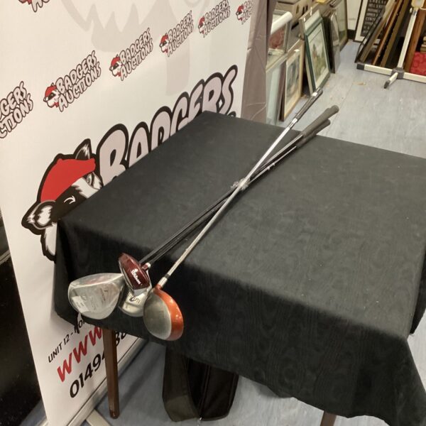 Lot of four vintage golf fairway woods including Taylormade.