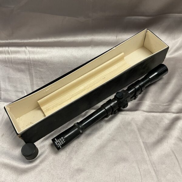 Vintage ASI 4x20 rifle scope with classic design.