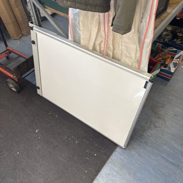 Large office whiteboard for presentations and brainstorming sessions.