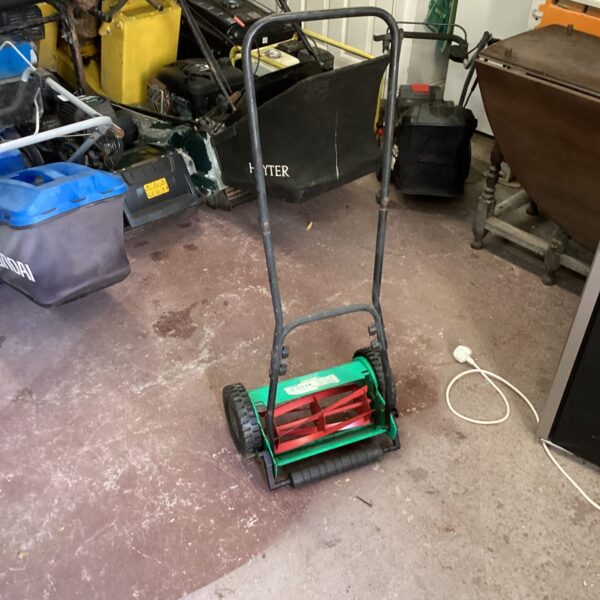 Vintage Powerbase push lawn mower in used condition.