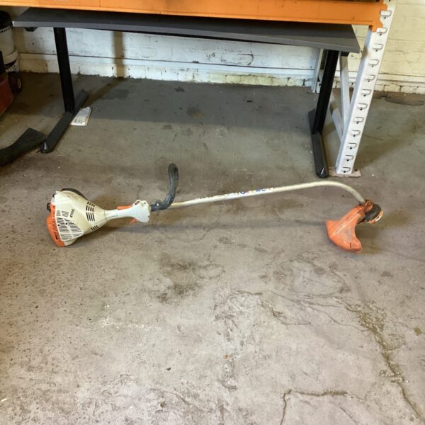Used Stihl FS40 petrol strimmer for garden maintenance.