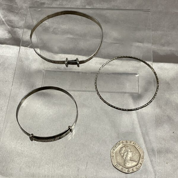 Lot of three antique silver christening bracelets.