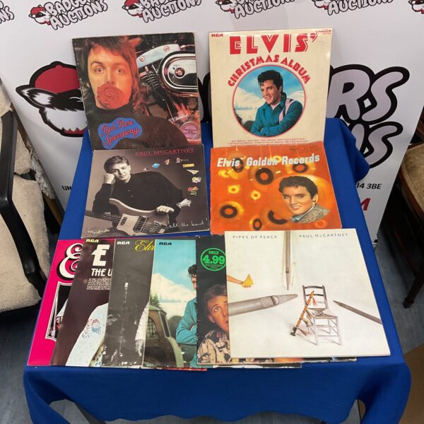 Vintage Paul McCartney and Elvis vinyl records lot for collectors.