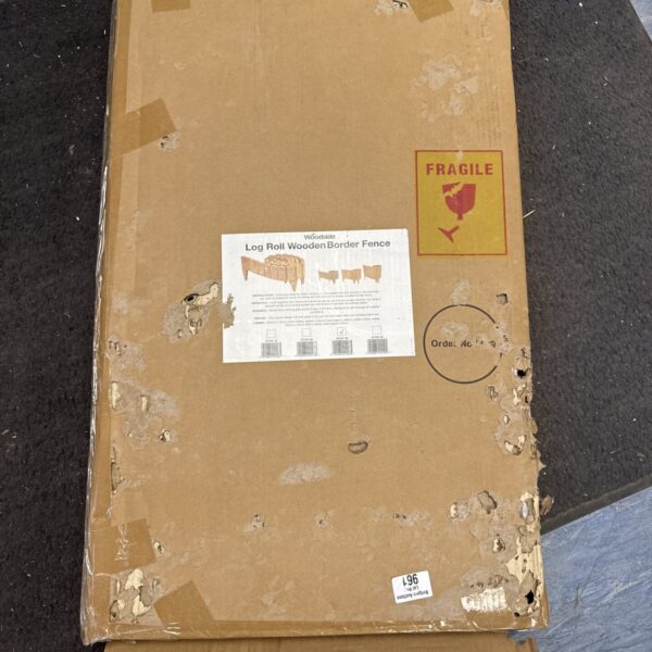 New roll of wooden log garden fence still sealed in its box.