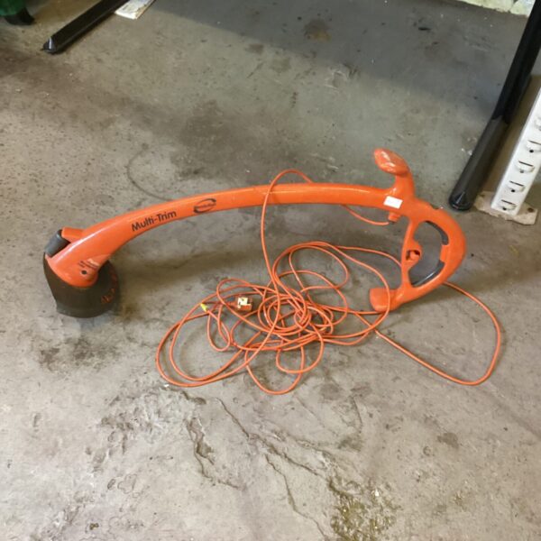 Used Flymo multi trim electric garden tool for lawn care.
