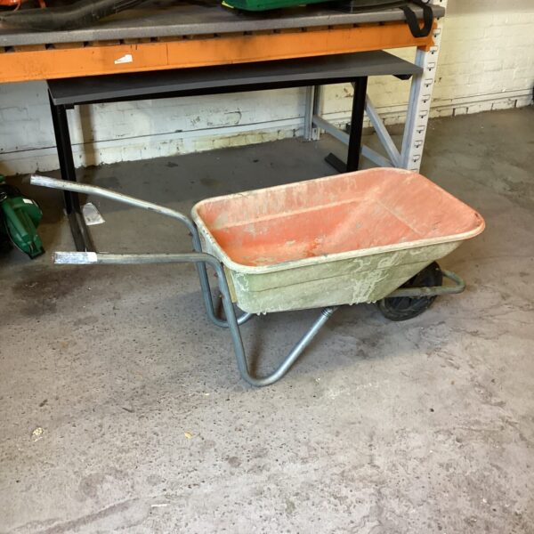 Used plastic wheelbarrow for garden and landscaping work.