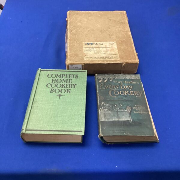 Antique cookery books including Mrs Beeton’s Everyday Cooking.