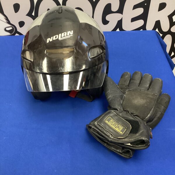 Nolan motorcycle helmet and Duke accessories for riders.