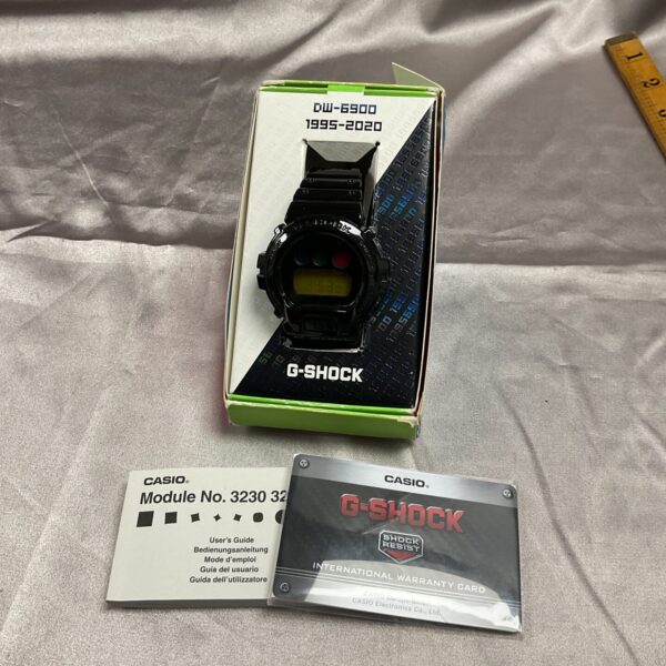 Vintage Casio G Shock DW6900 digital watch with box.