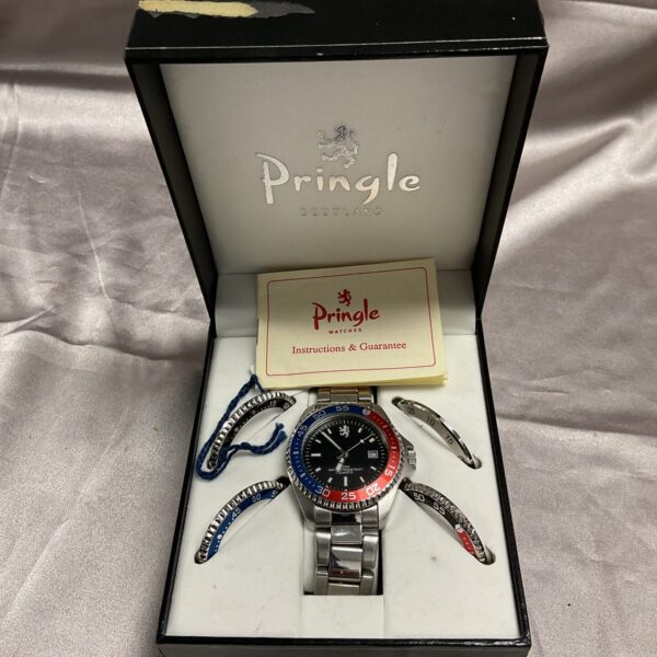 Pringle Scotland watch with interchangeable bezel in original box.