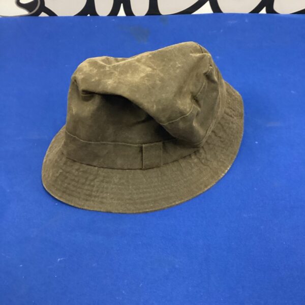 Vintage Barbour wax hat, classic country outdoor wear.
