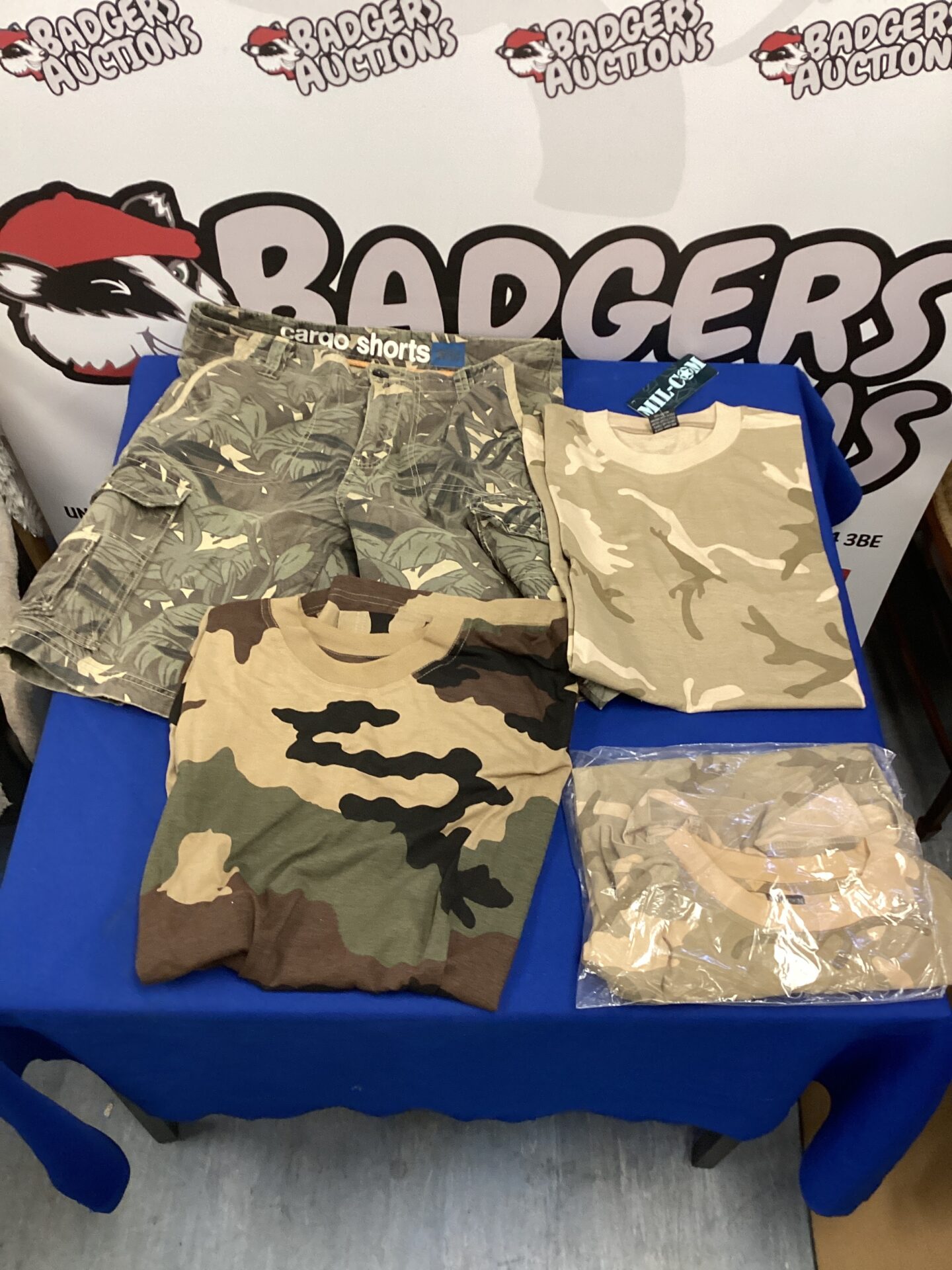 486 pair of camo shorts & 3 new tshirts