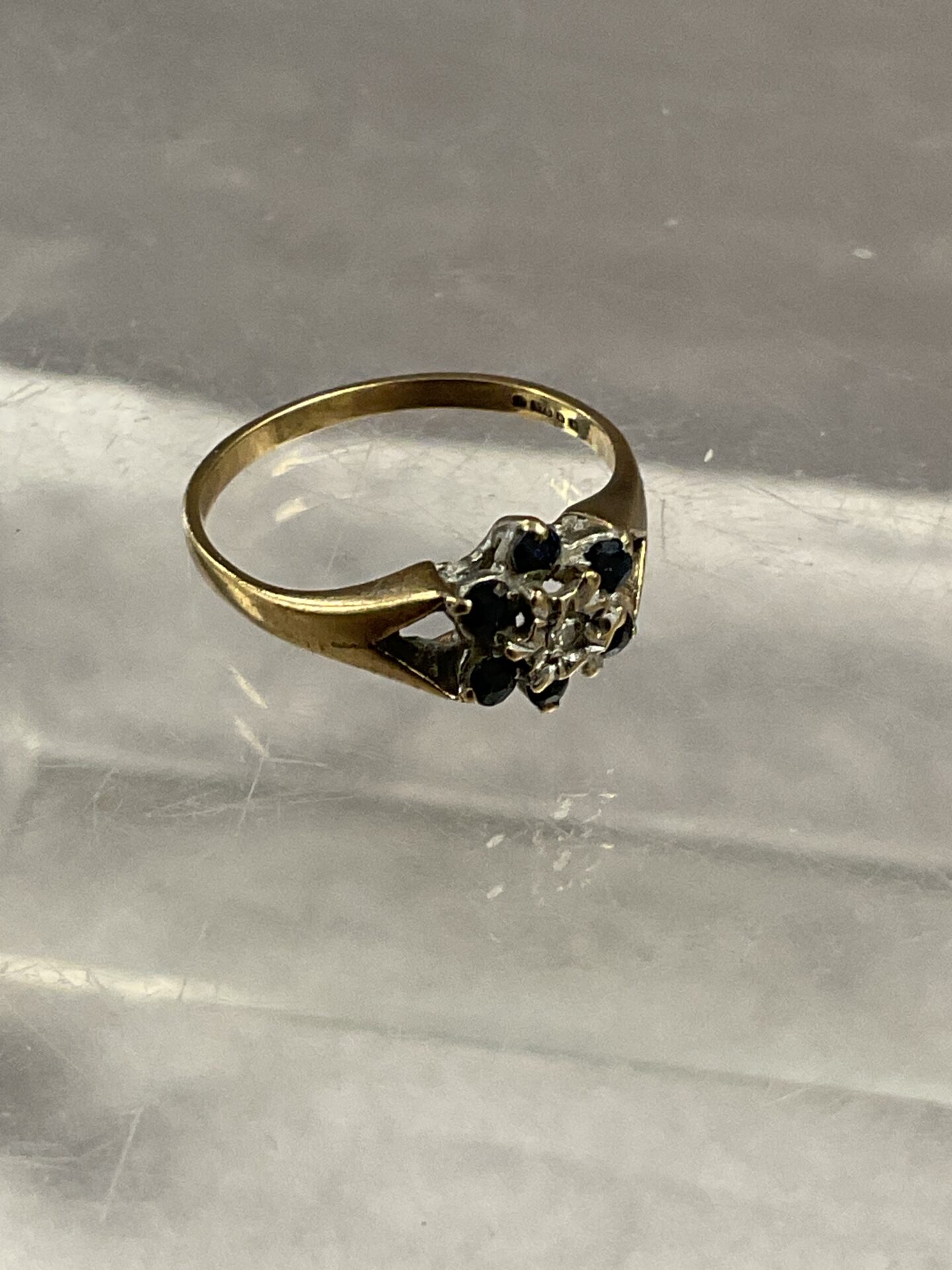 775 9 carat gold hallmark .375 diamond and sapphire ring size N1 .74 g gross