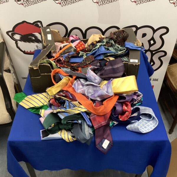 A colourful lot of assorted men's ties for sale.