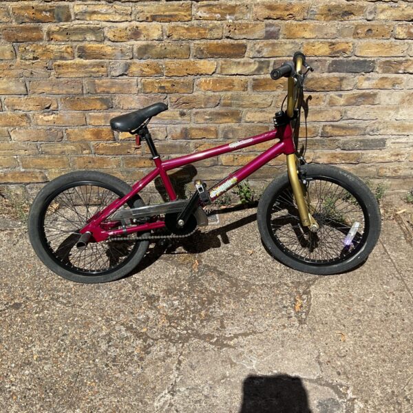 Red Raleigh Burner BMX bike, vintage 1980s retro bicycle.