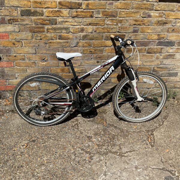 Blue and black Merida Dakar 624 kids mountain bike.