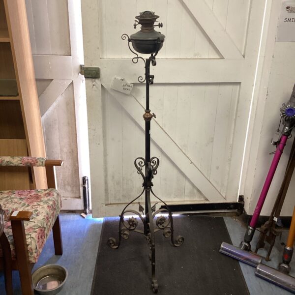 Antique Victorian oil lamp stand by Hinks & Son, wrought iron construction.