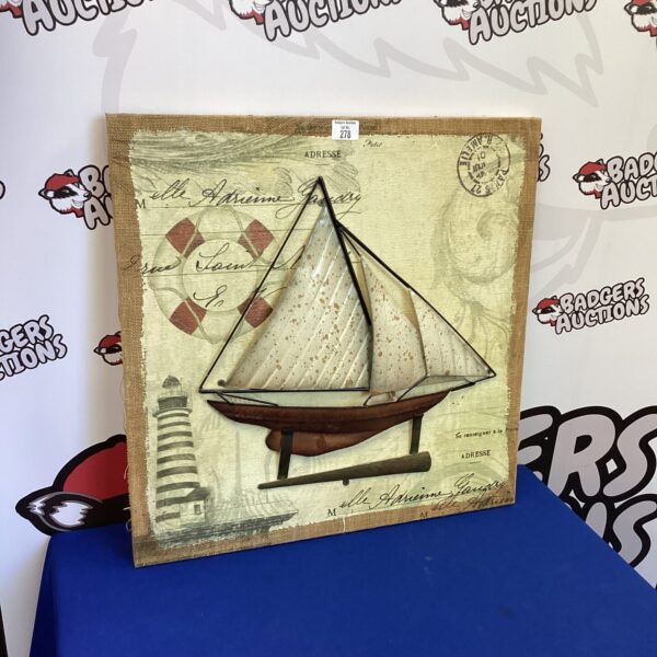 Rustic 3D sailing boat decor on hessian background.