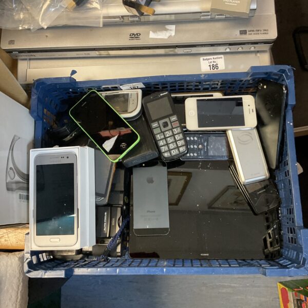 Mixed lot of mobile phones, tablet, and camera for repair or collection.