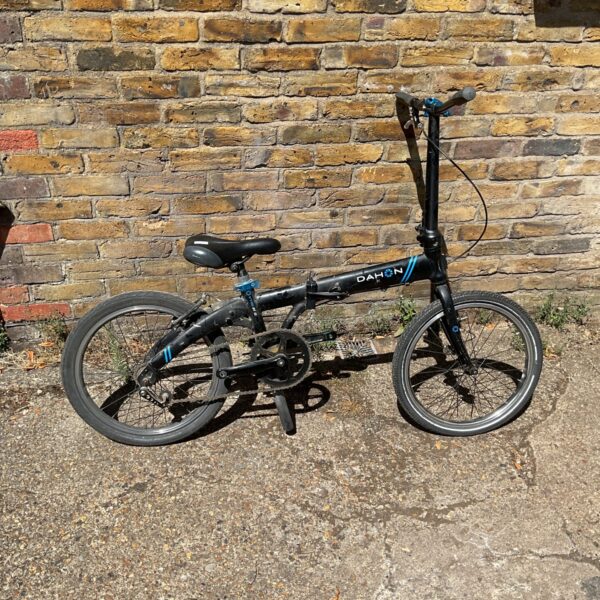 Black Dahon Vybe D7 folding bike, compact and portable.