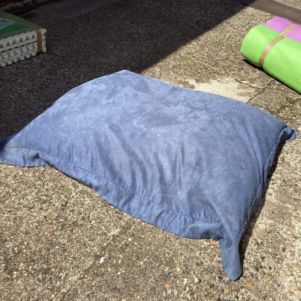 Large "Big Bertha" bean bag chair for comfortable floor seating.