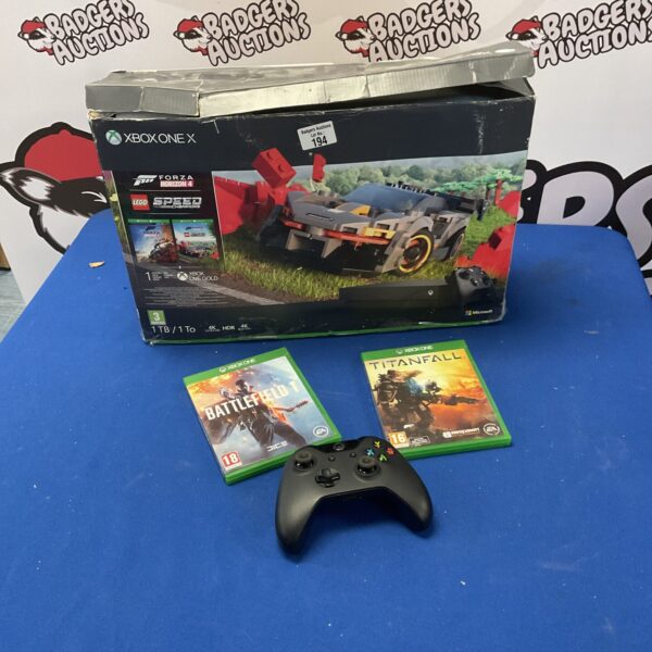 Xbox One X console with Titanfall and Battlefield 1 games included.