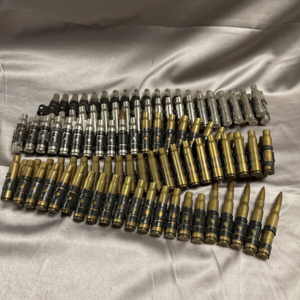 Close-up of a spent bullet belt made from brass casings.