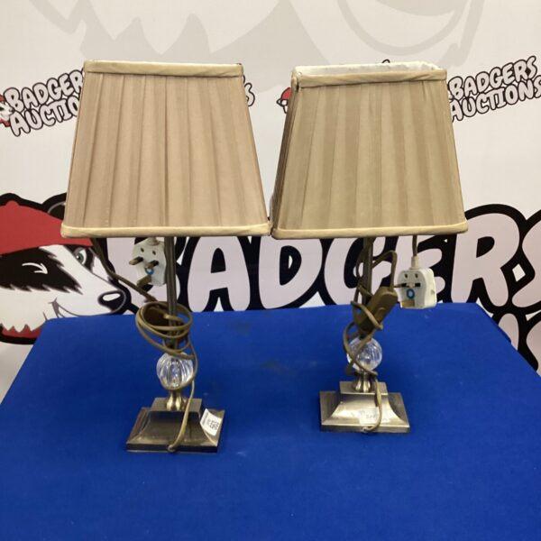 Pair of vintage brass table lamps with shades.