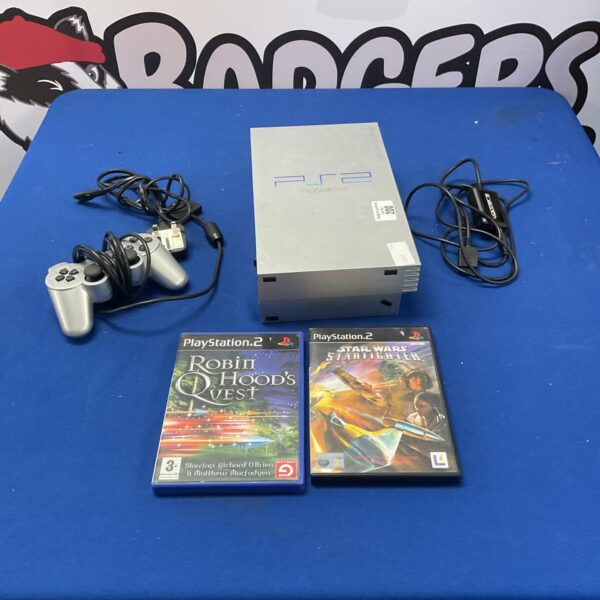 Sony Playstation 2 console with remote and two games for retro gaming.