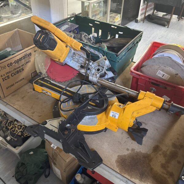 JCB mitre saw offered for spares or repair, showing sparking bushes.