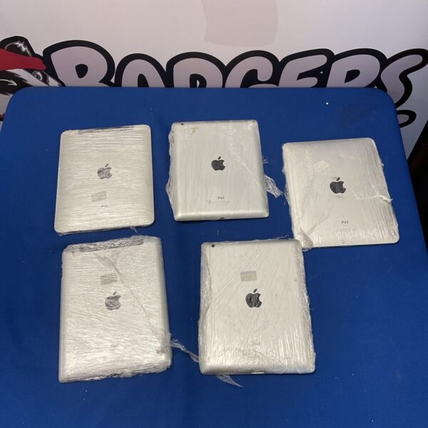 Lot of five damaged Apple iPads for repair or parts.