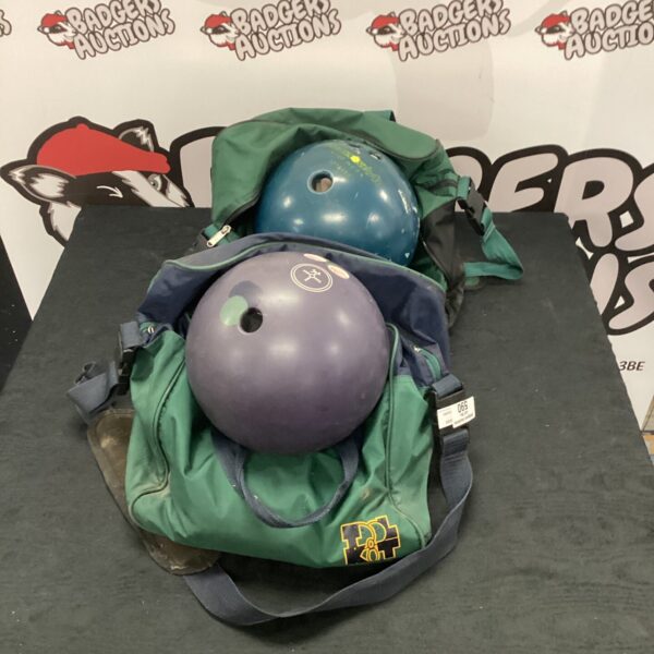 Vintage bowling ball pair, showing wear and tear.