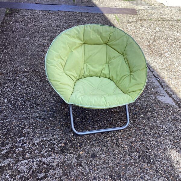 Padded seat of a portable folding fishing chair.