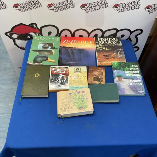 Mixed book lot including gardening and whiskey lore titles.